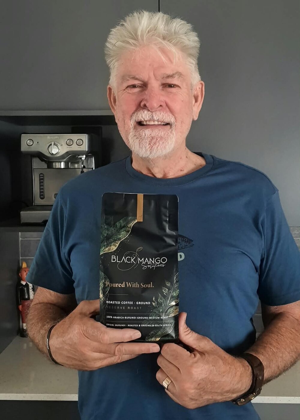 Peter, a friend of the firm, with a bag of Black Mango Reserve Roast