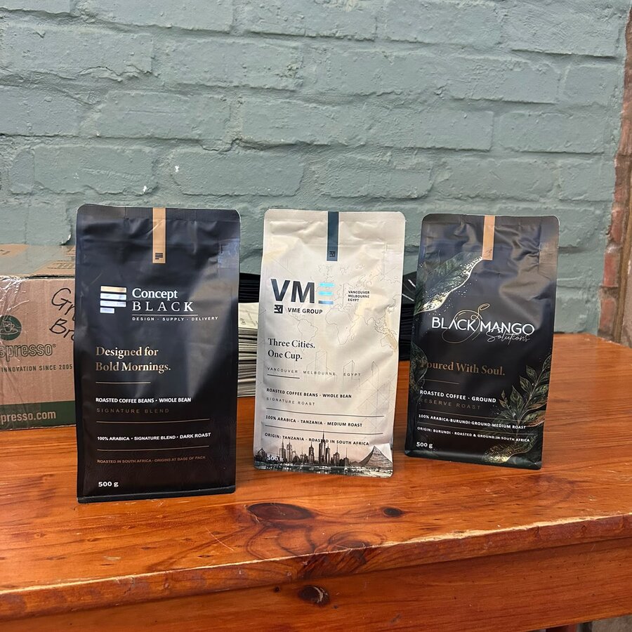 The three Concept Black coffee roasts on the counter